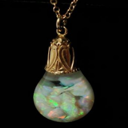 Art Deco Floating Opal Necklace with 14k Bail & Chain. Circa 1931