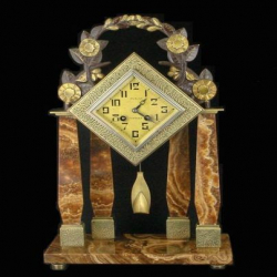 Art Deco French Bronze, Brass and Marble Mantel Clock. Circa 1920
