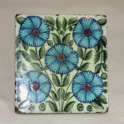 William De Morgan Tile Decorated with Five Flower Heads. Circa 1880