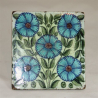 William De Morgan Tile Decorated with Five Flower Heads. Circa 1880