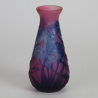 Emile Galle Nancy Cameo Vase with Purple Blue Flowers on a Pink Background
