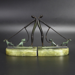 In the Manner of Hagenauer - Pair of Bronze Bookends with Figures and Dogs on a Leash