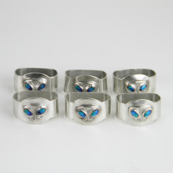 Archibald Knox for Liberty & Co Set of Six Pewter and Enamel Napkin Rings