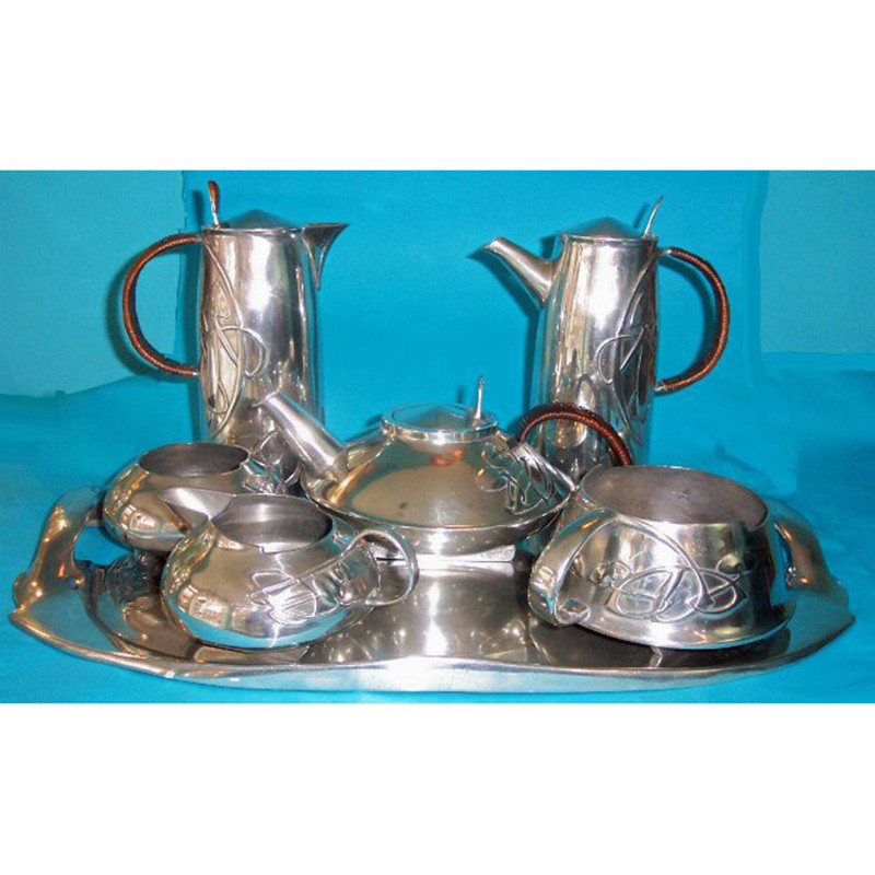 Archibald Knox for Liberty & Co antique seven piece pewter tea and coffee set. Stamped marks - English Pewter 0231 (c.1903)