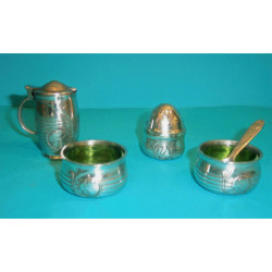 Archibald Knox Tudric pewter condiment set with original glass liners (c.1904)