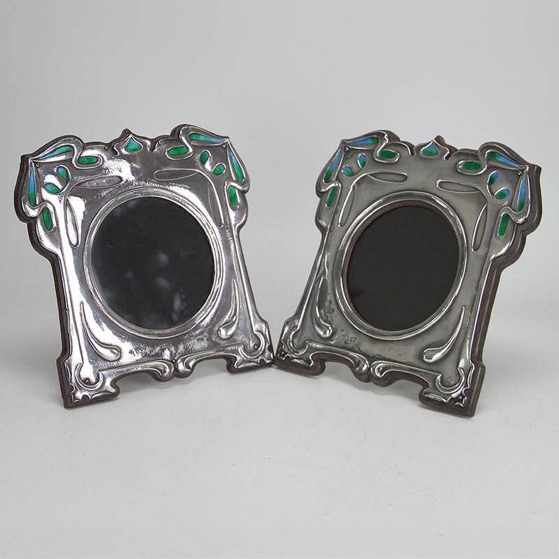 Pair of William Hutton Art Nouveau Silver and Enamel Photo Frames (1905 and 1907)