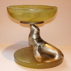 Bronze Seal Figure Balancing an Onyx Bowl on its Nose. Circa 1925