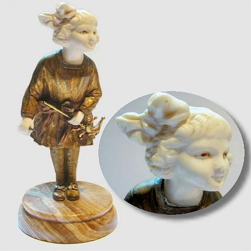 J. DAste Bronze & Ivory Figure of a Young Girl with Mr Punch